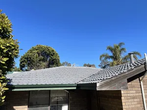Photo of a roof done with the colour: Colorbond Wallaby
