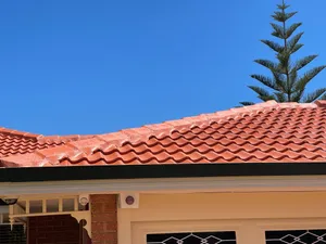 Photo of a roof done with the colour: Terracotta