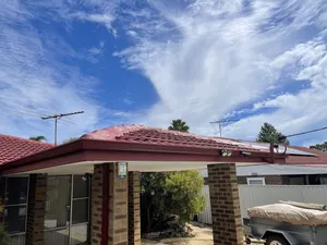 Photo of a roof done with the colour: Colorbond Manor Red