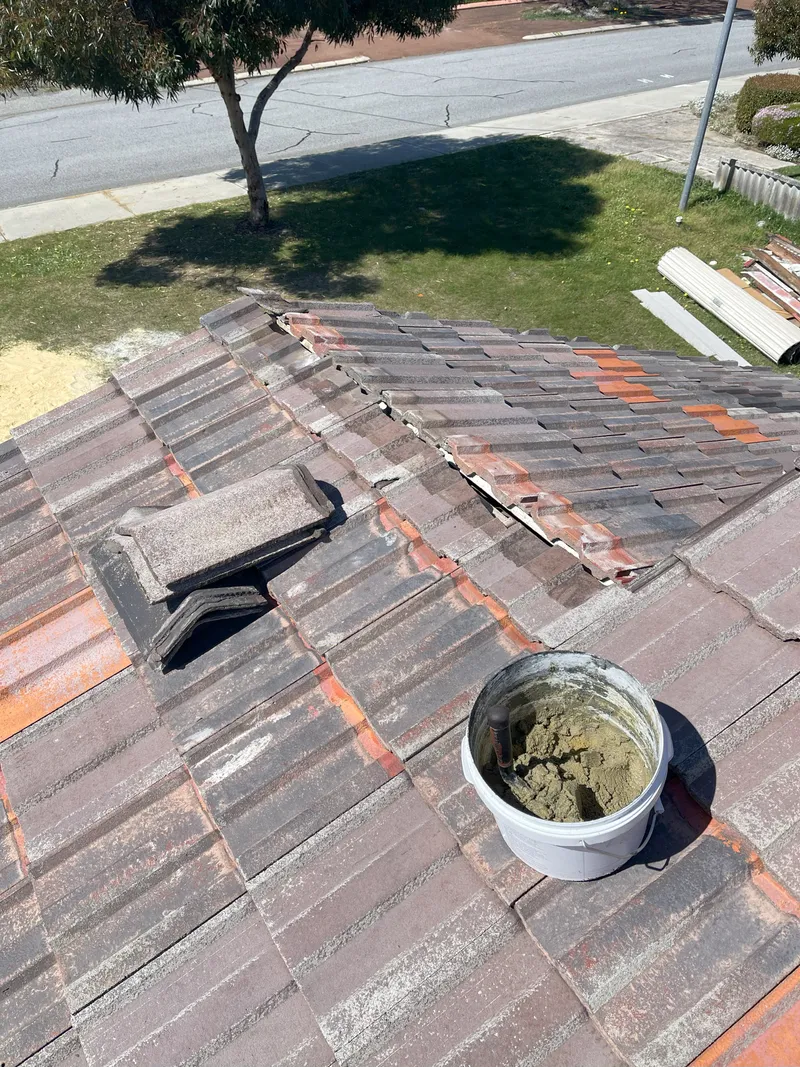 A photo of a roof being rebedded by Roof Restorers Perth