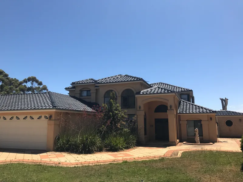 Perth roof with Charcoal Dulux Acratex coating - view 6