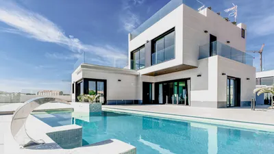 Modern house with flat roof showing tile and surface conditions
