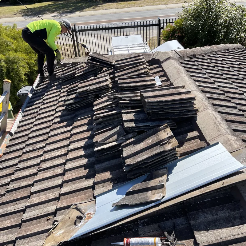 A Perth home weighing up roof restoration against full roof replacement